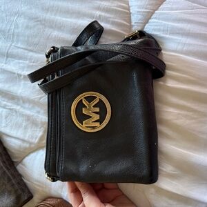 Michael Kors Black Crossbody Bag with Gold Emblem